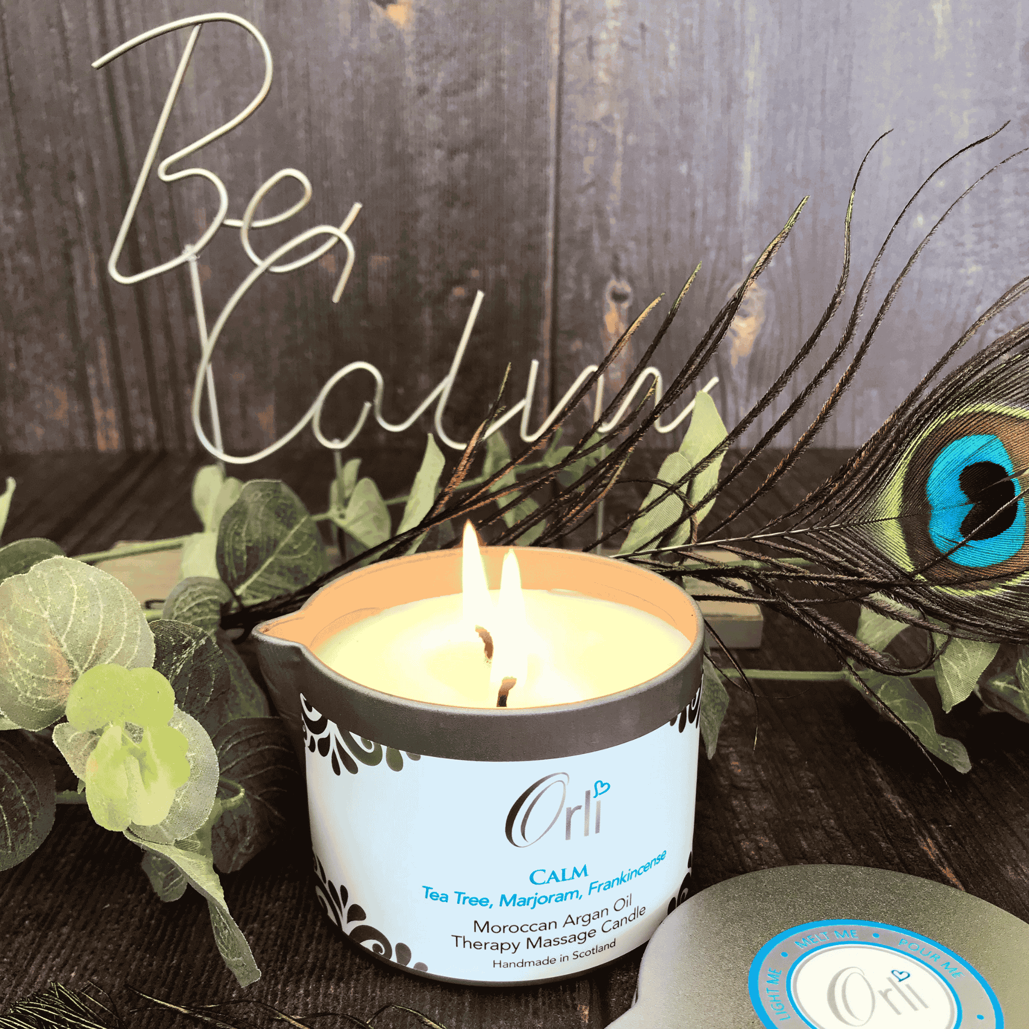 Calm massage candle used in relaxing spa treatment for stress relief and deep relaxation