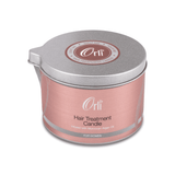 Hair treatment candle melted oil texture and nourishing blend for healthy shiny hair