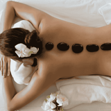 Hot stone massage training course for professional therapists using heated stones for deep relaxation treatments