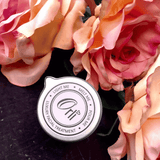Rose and neroli facial massage candle melted oil texture and skincare application