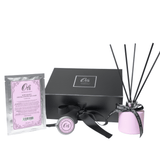 Rose and rhubarb luxury gift box with fragrance products for indulgent self care and gifting